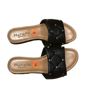 Used slip on black and metal rhinestone sandals